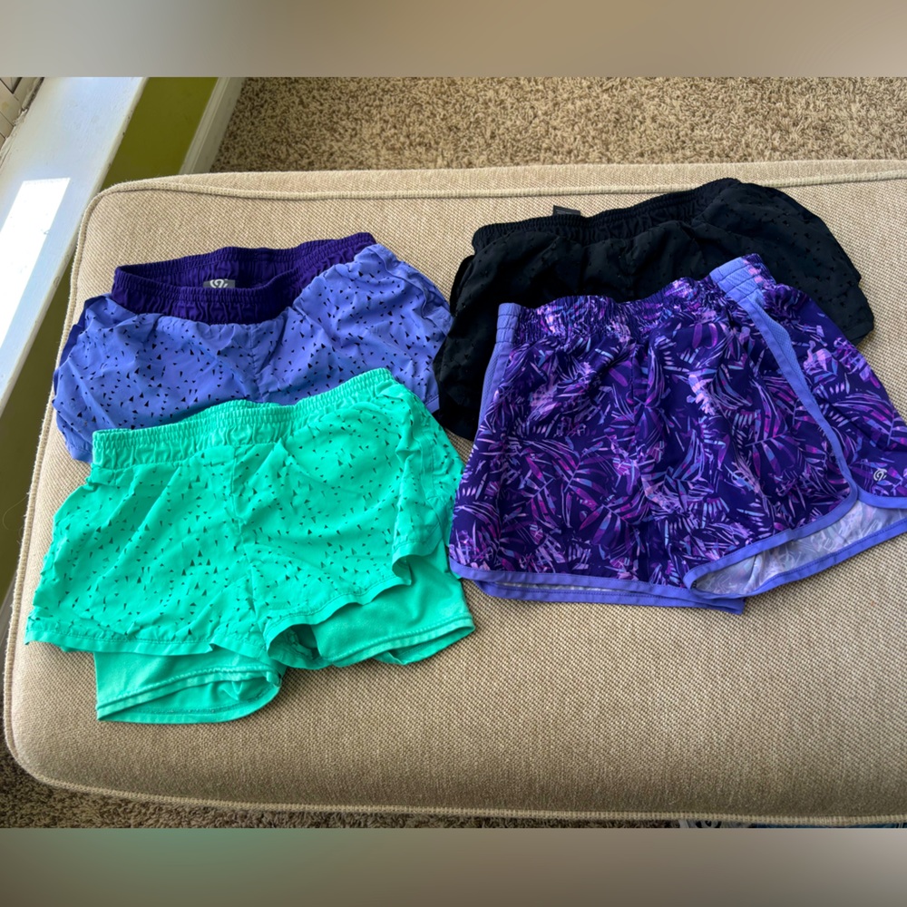 Champion girls shorts 4 pack. Girls size 7/8 used condition